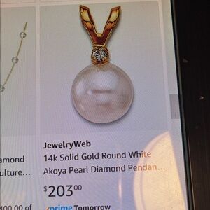 14 kt Gold Pearl with Diamond accent Pendant